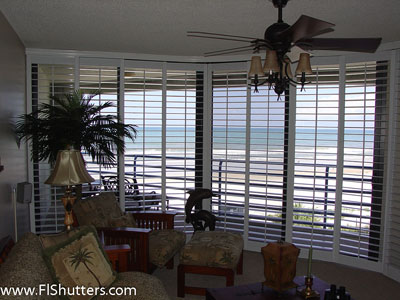 interior sliding shutters on curved opening