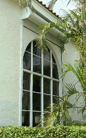 roll up hurricane shutter over arch window