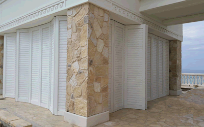 Exterior Bi-fold sliding shutters